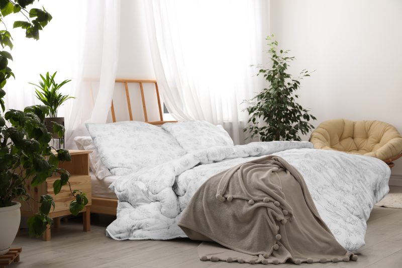 Light modern room interior with comfortable bed Light modern room interior with comfortable bed